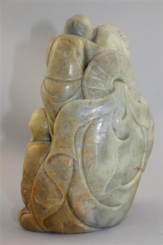 A Chinese soapstone group of three Luohan, 20th century, 22cm